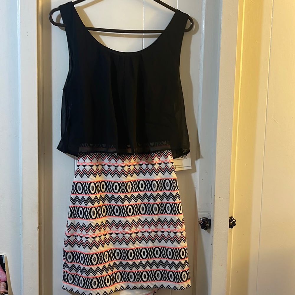 Mini dress with open back, brand new never been wore before
